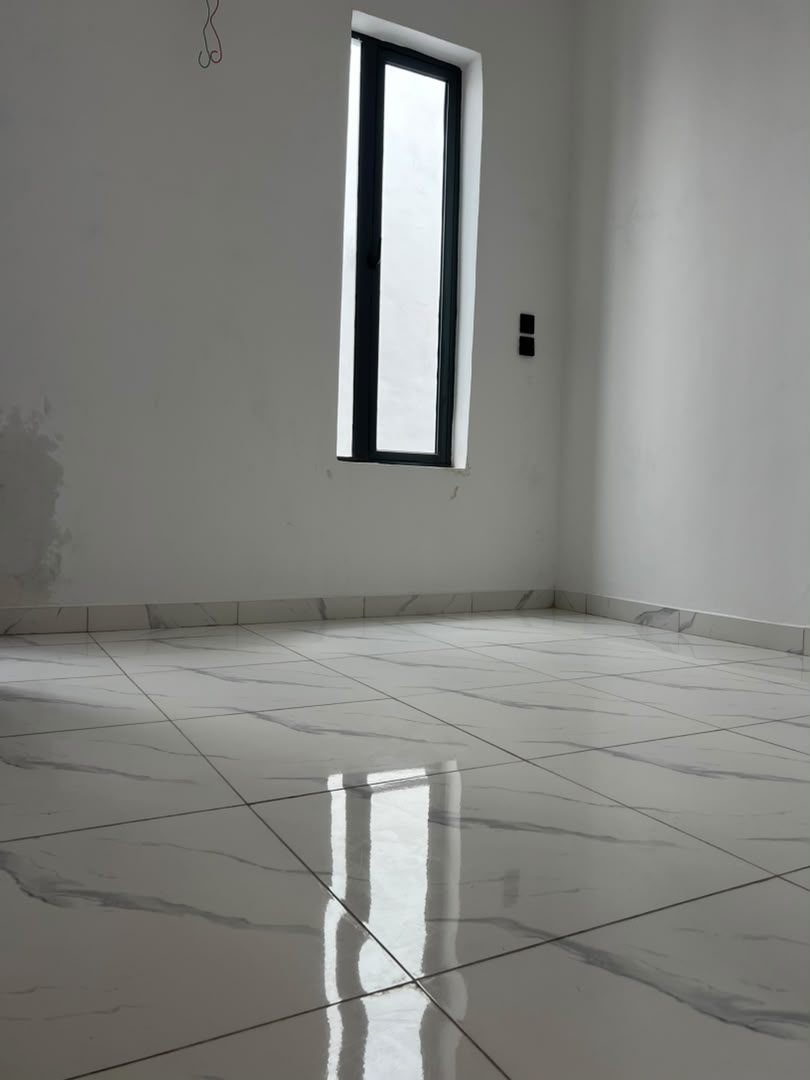 4 bedroom semi-detached duplex, Sangotedo — living area with TV wall